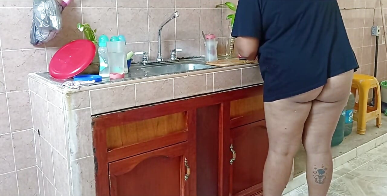 Chubby Stepmother Washes and Cleans the Kitchen