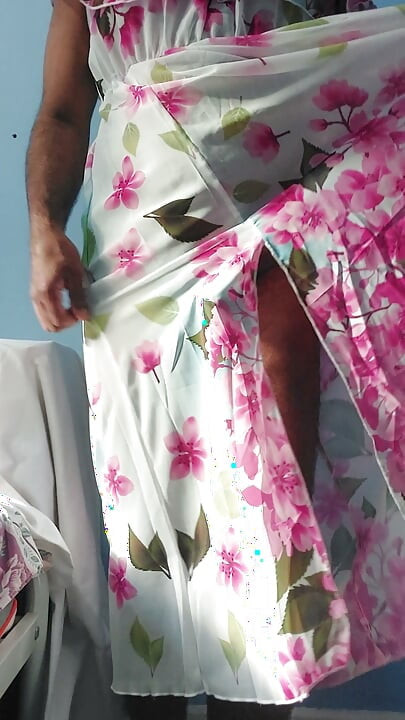 Shemale masterbate and cum in a silky seethrough Chiffon Fleared floral frock
