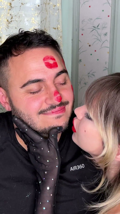 Red Lipstick Kisses Cover His Entire Face