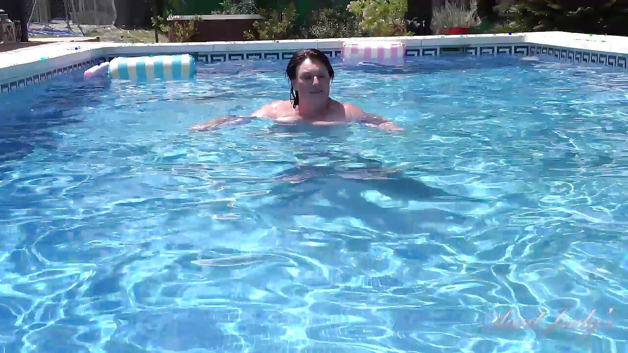 Busty Redhead MILF JoJo Robinson Goes Skinny Dipping in the Pool