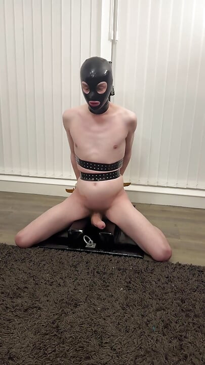 Naked Twink Is Strapped to the Kneeler and Rubbed All Over with Baby Oil