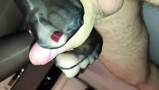 Sexy glossy pantyhose feet give hot footjob