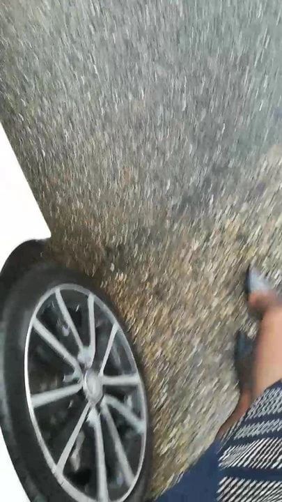heel ride in the rain with an umbrella