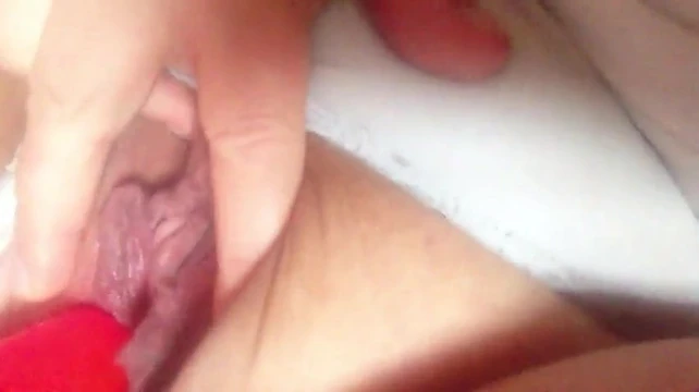 Teasing with dildo