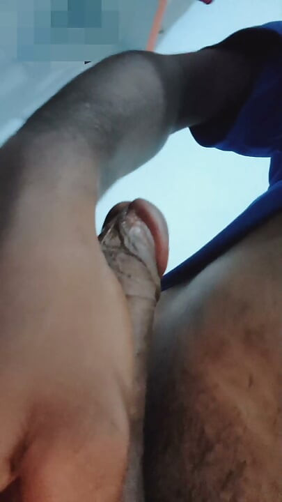 Yua caresses the boy's penis, making it thicker and longer