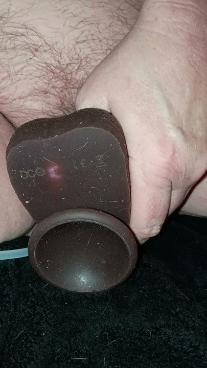 Playing with my black dildo...