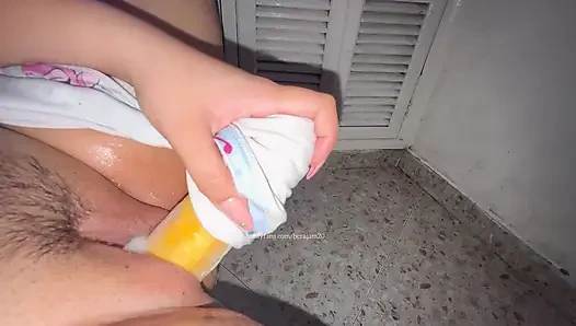 Trying for the first time young girl with cucumber