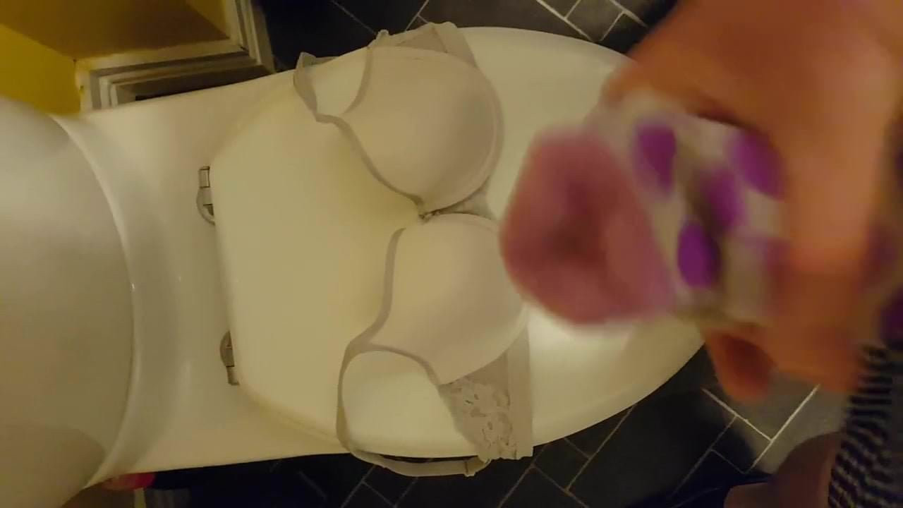 Sock handjob cum on bra