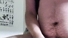 Chubby guy jerks small chode cock until he cums