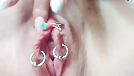 Russian whore hand fucking her pierced wet pussy