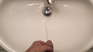 Pee in the bathroom sink