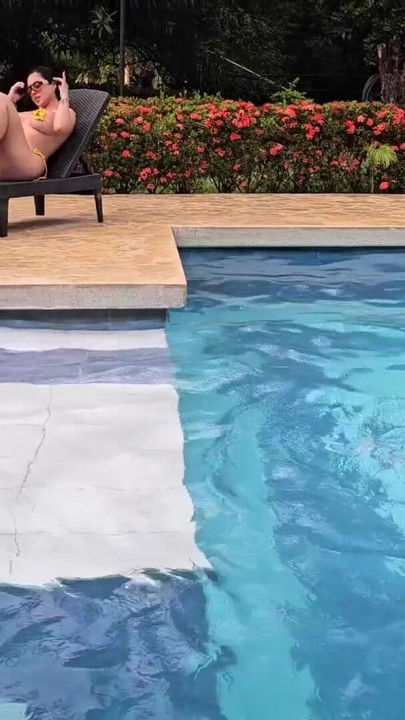 Mariana makes Yeri and Raul give her a double penetration in the pool in the rain | Clip 1