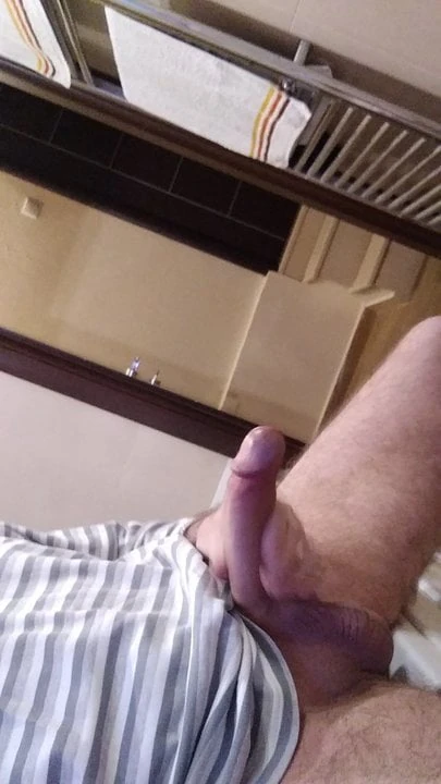 Stroking my erected cock