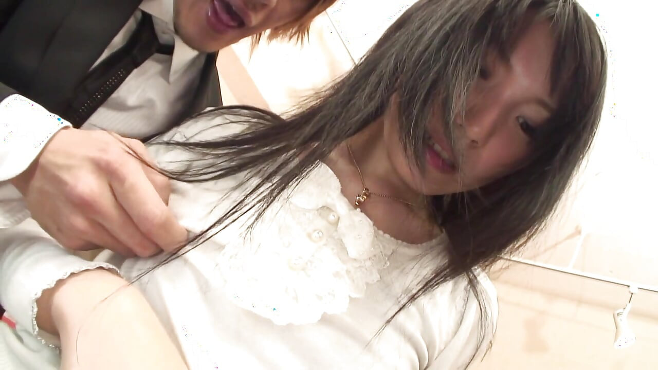 Adorable Japanese teen moans while taking in two hard boners