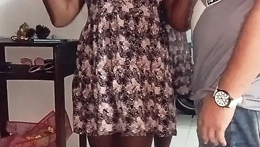 My neighbor welcomes me in a mini dress