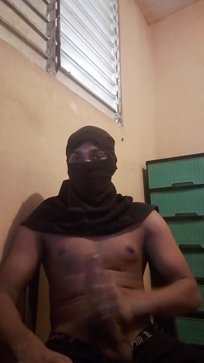 Masked big black cock masturbates