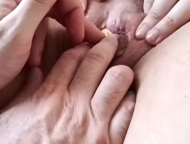 Masturbation with a Guitar Plectrum on Clit