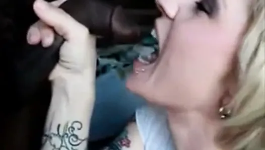 kinky slut bites hard in a black cock