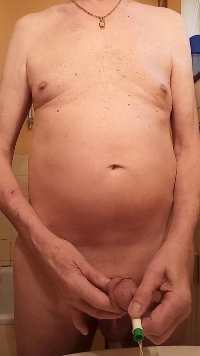 pissing through a catheter