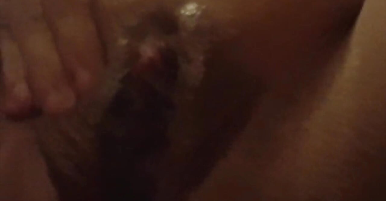 Masturbating