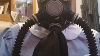 Sissy maid in gas mask