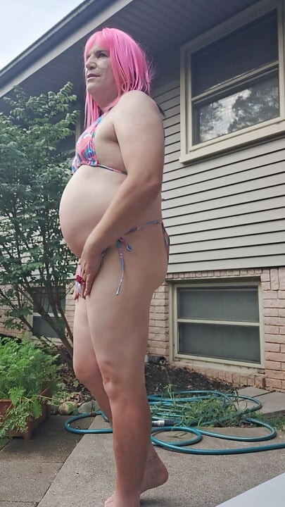 Feeling horny in my new bathing suit outside on the patio!