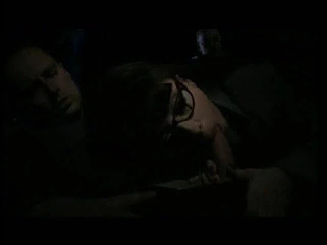 Brunette with glasses at the cinema