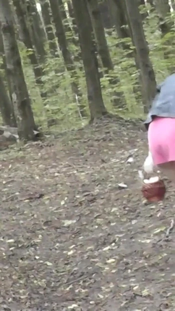 Emotional moment from "Milf under skirt no panties picking mushrooms in forest. Ass Milf. Outdoor. Outside. Doggystyle."