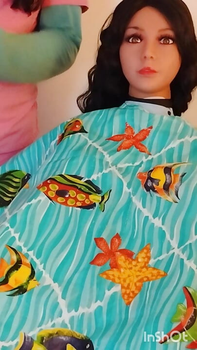 Lindsey modelando capas coloridas, boneca sexual peituda