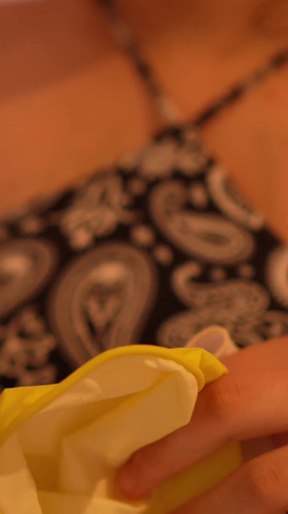The Stepsister Shows Both of Her Gloves Because She Has a Glove Fetish. One Glove Is a Yellow Dishwashing Glove. the Other