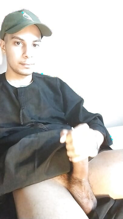 Arab daddy with a mustache shakes his big cock