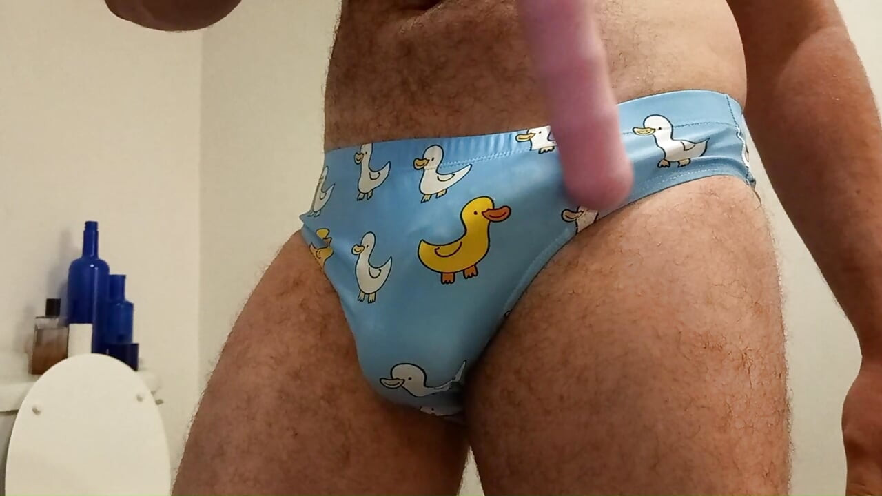 Speedo cum. Rubbing, vibrating, masturbating small penis bulge in speedo, swim trunks, brief. Please humiliate in the comments.