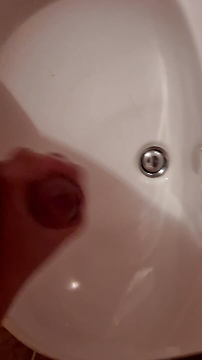 Nicely jerked off in the bathroom