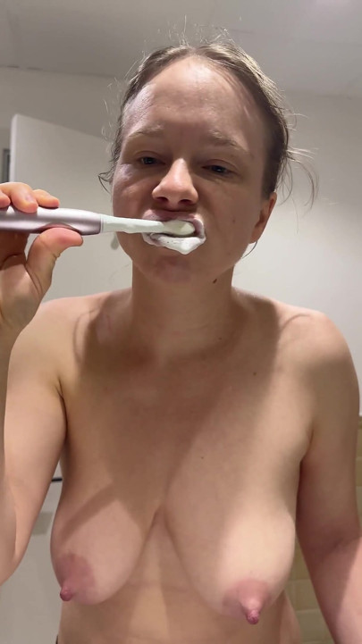 Teen with Braces Brushes Her Teeth