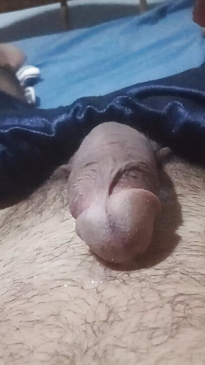Man lying down masturbates while his neighbor is softening with his wife