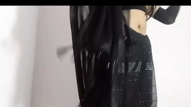 Lavisha Saxsena removing her black Saree and a bra for her naked dance performance Hindi audio.