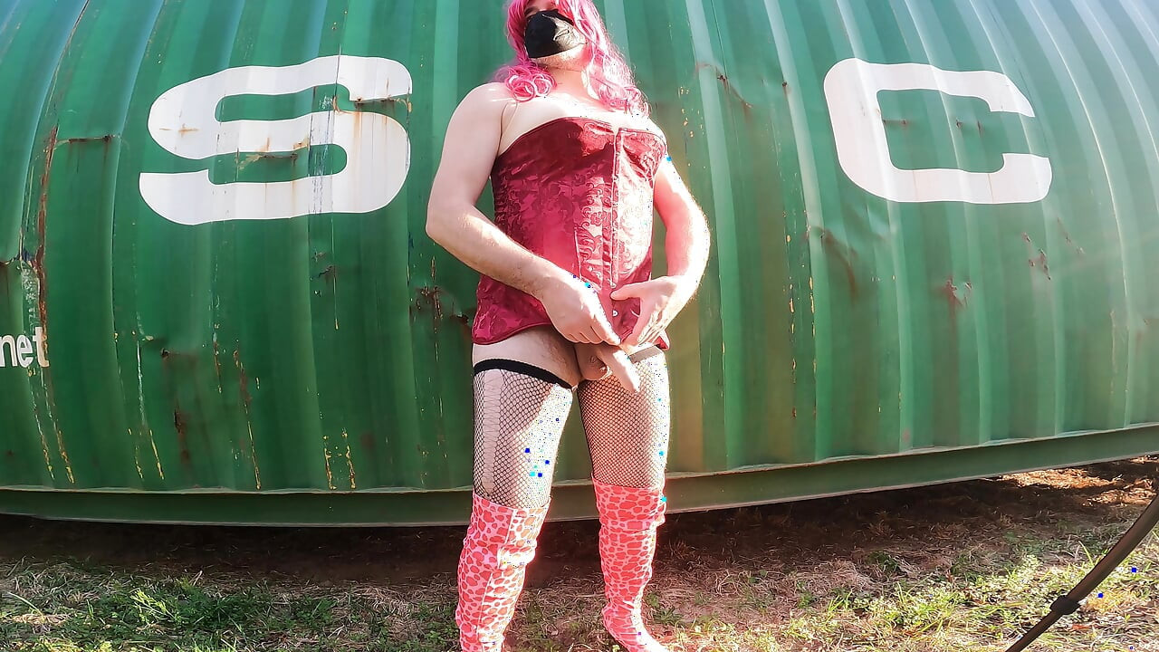 Big soft fake tits crossdresser having jacking off by a shipping container
