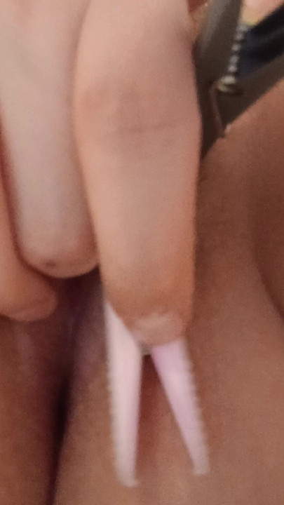 Clothespins on labia
