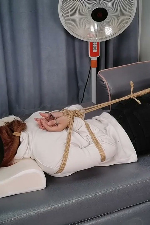 The Extreme Restraints of a Barefoot Girl, Playing with Her Bare Feet