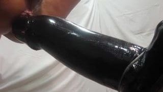 Make love with a giant dildo