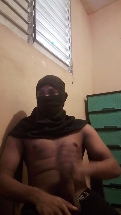 Masked big black cock masturbates