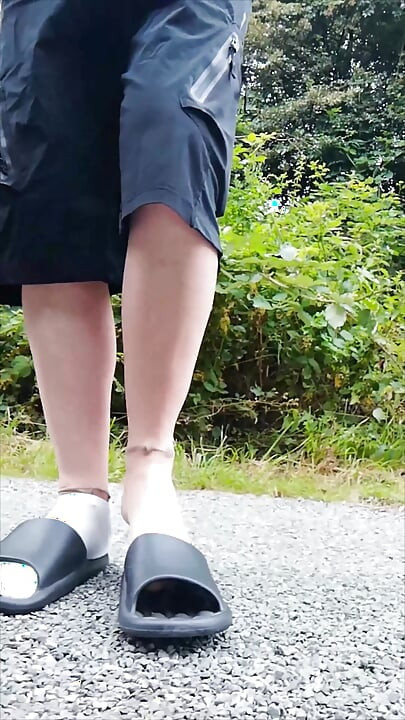 In Slippers and White Socks in Nature