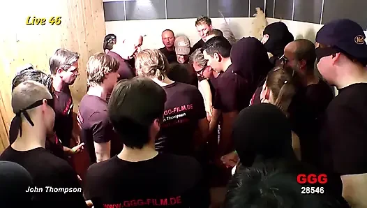 Bukkake Slut Gets Her Face Drenched by a Massive Crowd
