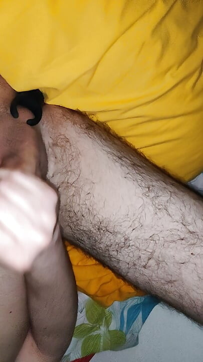 Horny young guy masturbates and has a strong orgasm