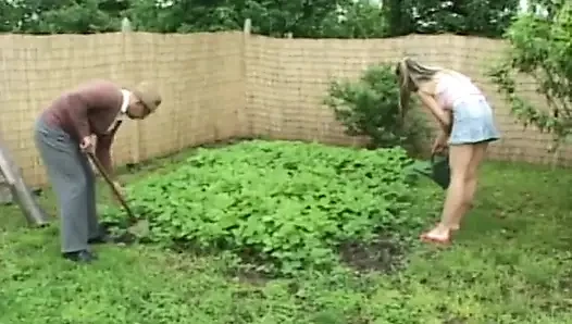 Dirty old man get his cock sucked by a young brunette in the garden