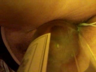 Bottle in pussy and loveballs in ass