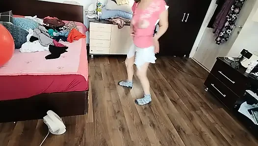 Amateur wife enjoys trying on clothes and cutting them.