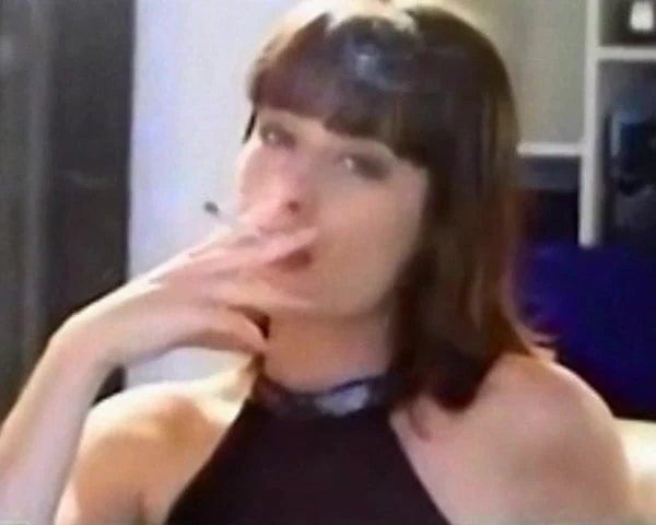 Woman Relaxes with a Smoke
