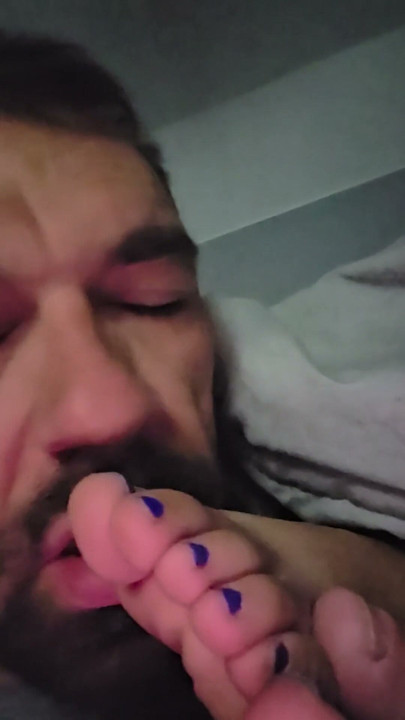 Sucking her toes while she watches a movie | Clip 1