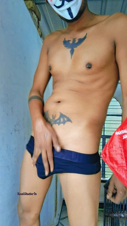 Open cock in red thong